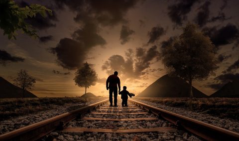 Father and son walk the path of life