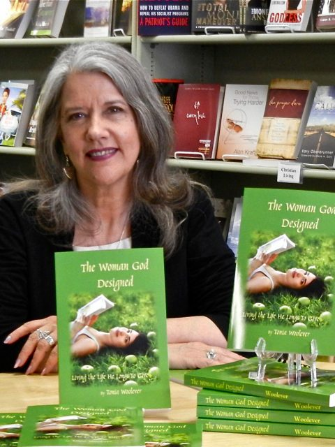 Tonia signs her books