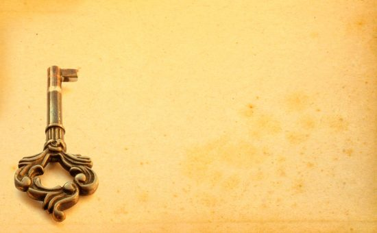 key on gold background